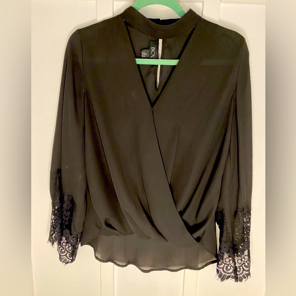Beautiful black BCX top with lace detail